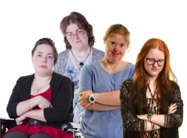 A group of women with their arms crossed. 