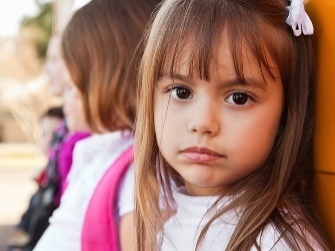 A girl looking sad.