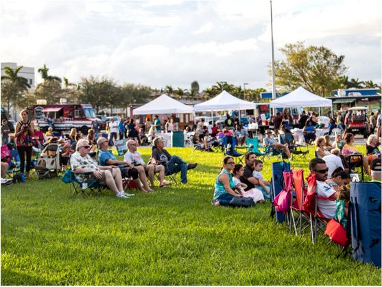 A large community of people at a local event.