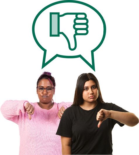 2 people with disability giving a thumbs down. Above them is a speech bubble with a thumbs down in it.