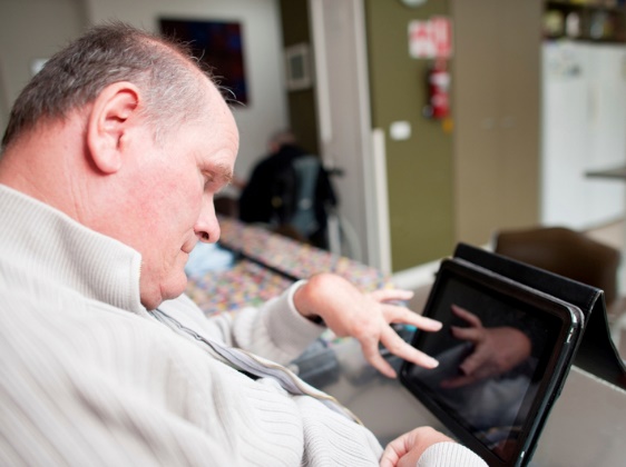 A person using a digital tablet. 