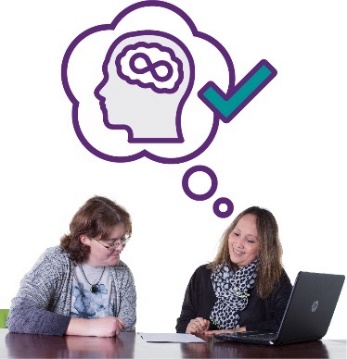 A person supporting someone while using a computer. Above them is a speech bubble with a Autism icon and a tick.