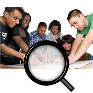 A group of people looking at a paper with a magnifying glass over

