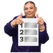 A person holding a document with numbered dot points.