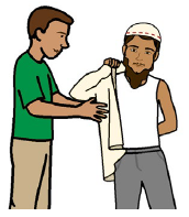 A person helping another person put on a coat.