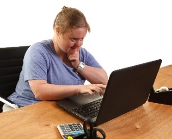 A person using a computer.