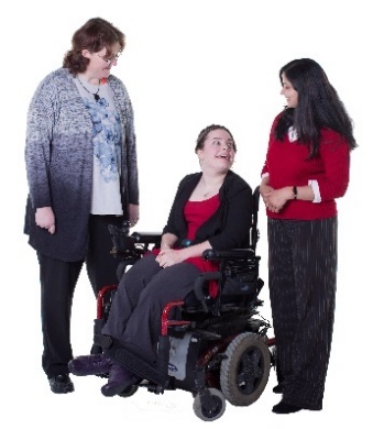 A person in a wheelchair talking to 2 other people.