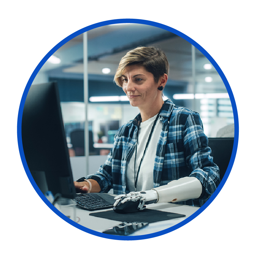Someone using a computer in an office.