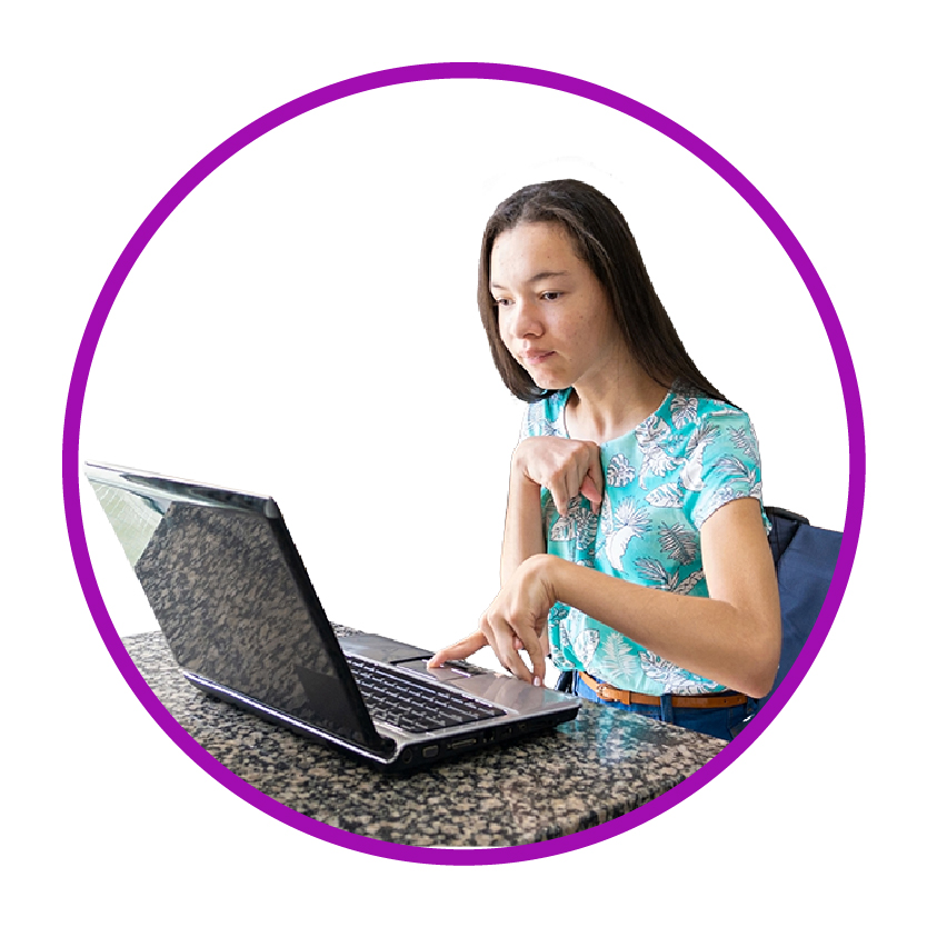 A person using a laptop.