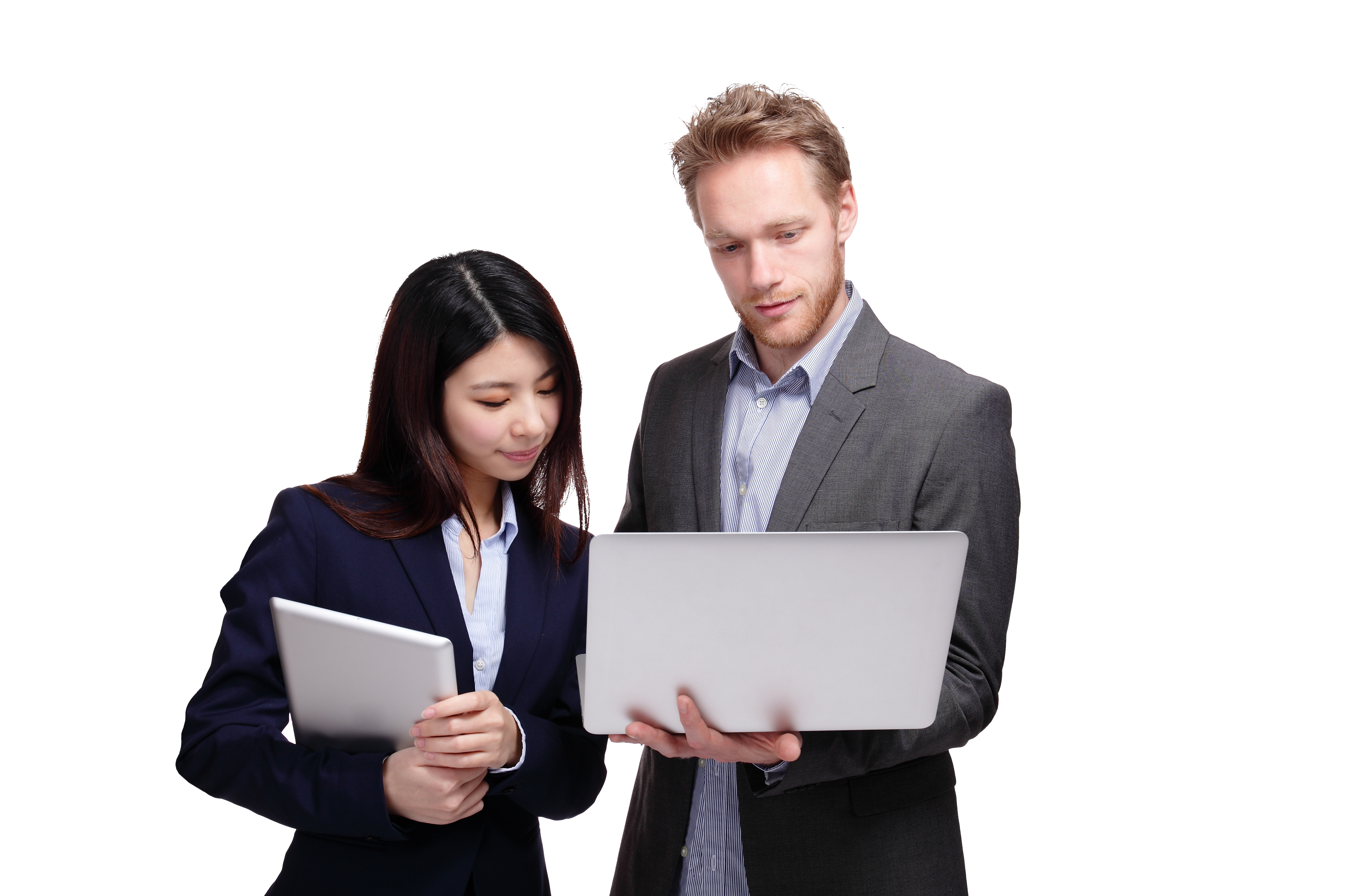 2 researchers looking at a laptop.