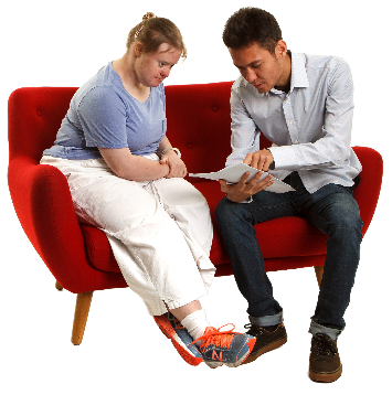 A person helping someone read a document.