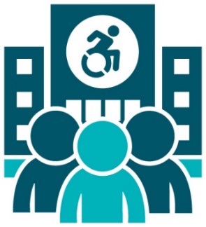 3 people in front of a large building with a disability icon on it.