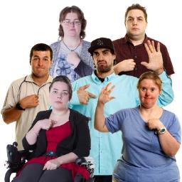 A group of people pointing at themselves.